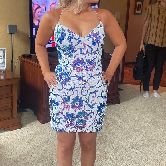 This is a Jovani size 2 sequin dress. Colors are mainly pink/blue iridescent - Picture 2 of 5